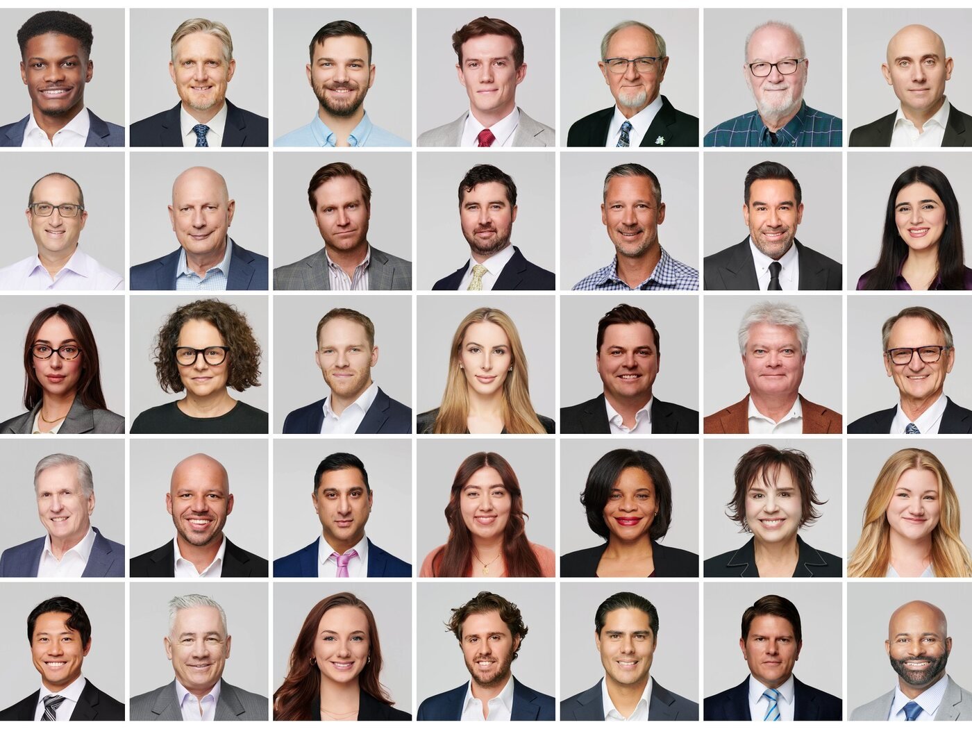 A grid of matching team headshots photographed by Ryan Dunbar